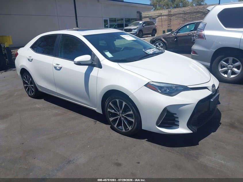 2018 Toyota Corolla VIN 5YFBURHEXJP776967 IAAI salvage auction — LEFT SIDE, Wait Title, sold $5,100 on 2026-08-20 (photo 1)