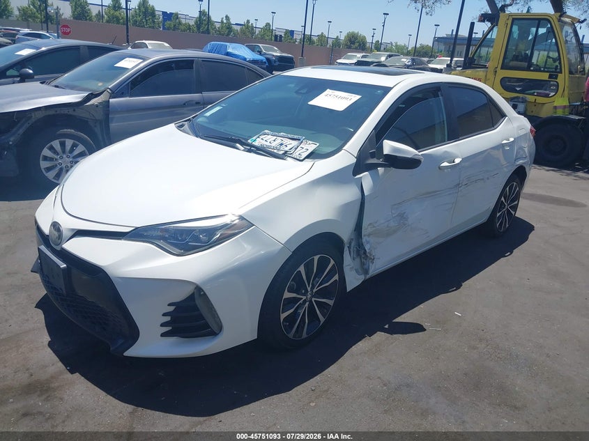 2018 Toyota Corolla VIN 5YFBURHEXJP776967 IAAI salvage auction — LEFT SIDE, Wait Title, sold $5,100 on 2026-08-20 (photo 2)