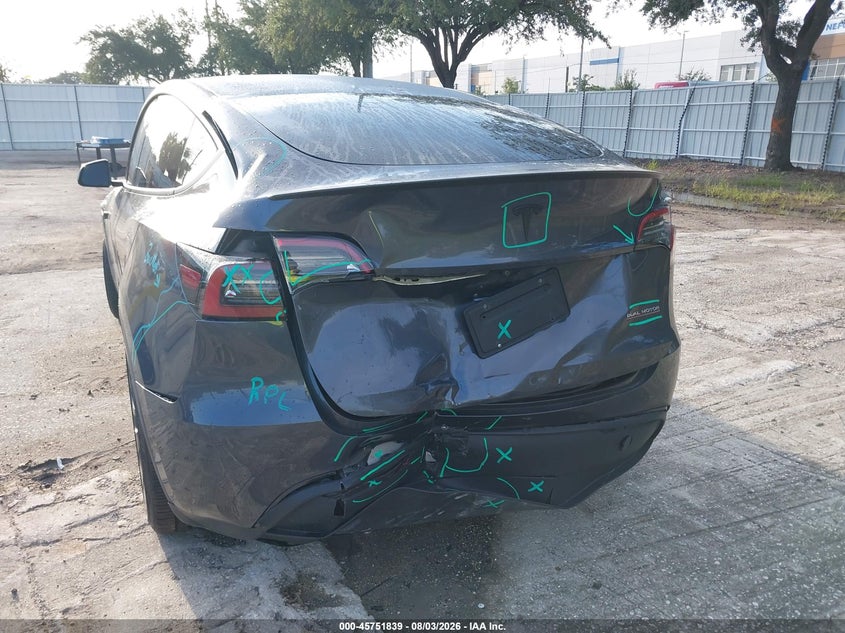 2022 Tesla Model y VIN 7SAYGDEF3NF404313 IAAI salvage auction — REAR END, Rebuildable (Florida), sold $7,600 on 2026-08-30 (photo 6)