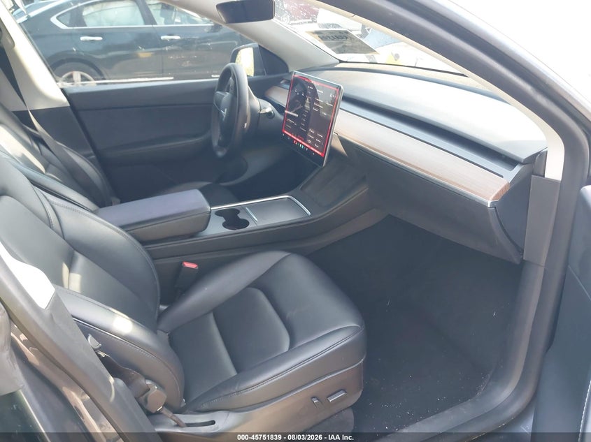 2022 Tesla Model y VIN 7SAYGDEF3NF404313 IAAI salvage auction — REAR END, Rebuildable (Florida), sold $7,600 on 2026-08-30 (photo 5)