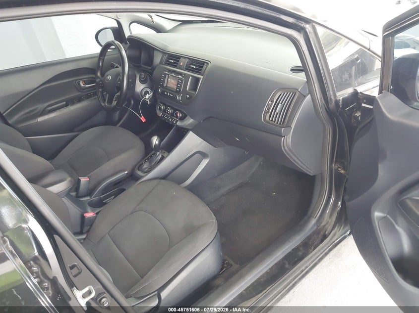 2014 Kia Rio VIN KNADN4A34E6349022 IAAI salvage auction — NORMAL WEAR, Clear (Florida), sold $700 on 2026-08-02 (photo 5)