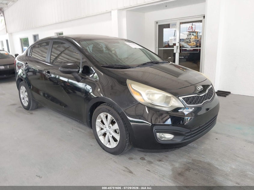 2014 Kia Rio VIN KNADN4A34E6349022 IAAI salvage auction — NORMAL WEAR, Clear (Florida), sold $700 on 2026-08-02 (photo 6)