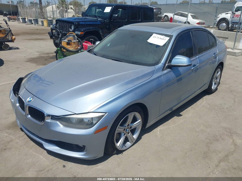 2014 BMW 3er VIN WBA3C1C59EK114766 IAAI salvage auction — NORMAL WEAR, Salvage Title, sold $1,500 on 2026-08-12 (photo 2)