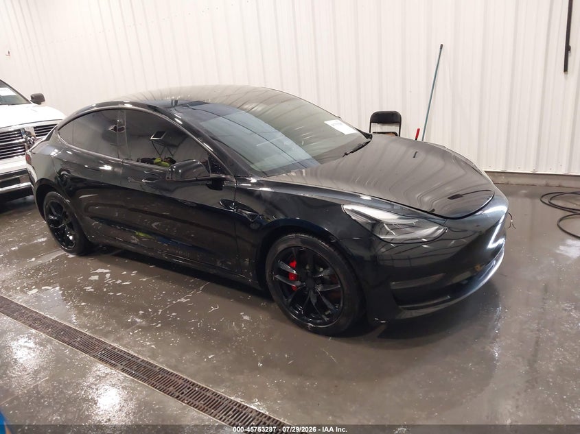 2022 Tesla Model 3 VIN 5YJ3E1EC3NF331803 IAAI salvage auction — LEFT REAR, Salvage (Nebraska), sold $10,900 on 2026-08-24 (photo 1)
