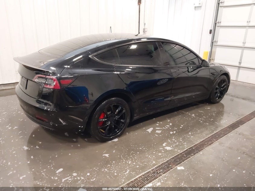 2022 Tesla Model 3 VIN 5YJ3E1EC3NF331803 IAAI salvage auction — LEFT REAR, Salvage (Nebraska), sold $10,900 on 2026-08-24 (photo 4)