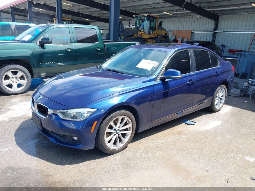 2018 BMW 3er VIN WBA8E5G58JNU47213 IAAI salvage auction — WATER/FLOOD, Salvage (Nebraska), sold $1,200 on 2026-08-30 (photo 2)