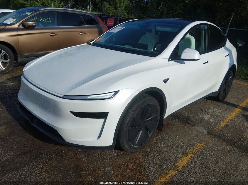 2026 Tesla Model y VIN 7SAYGDEE0TF557333 IAAI salvage auction — RIGHT FRONT, Wait Title, sold $28,300 on 2026-09-09 (photo 2)