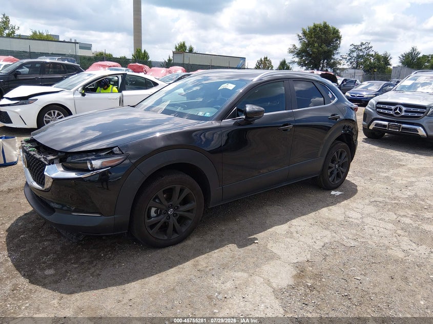 2024 Mazda Cx-30 VIN 3MVDMBBM4RM710402 IAAI salvage auction — FRONT & REAR, Salvage Title, sold $7,100 on 2026-08-23 (photo 2)