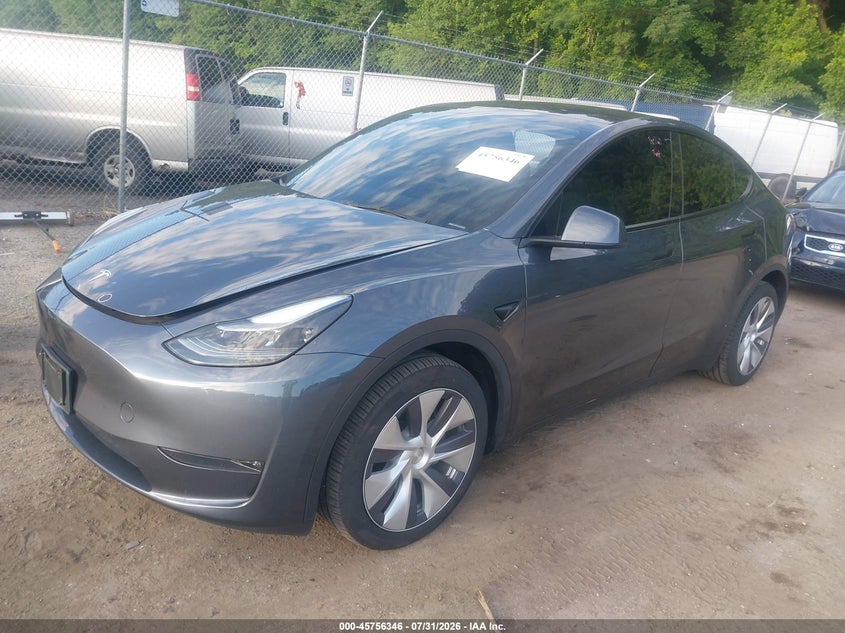 2023 Tesla Model y VIN 7SAYGDEE4PA205763 IAAI salvage auction — RIGHT SIDE, Salvage Title, sold $10,400 on 2026-08-27 (photo 2)