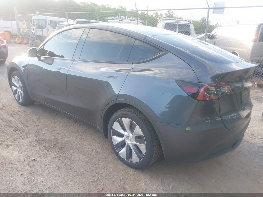2023 Tesla Model y VIN 7SAYGDEE4PA205763 IAAI salvage auction — RIGHT SIDE, Salvage Title, sold $10,400 on 2026-08-27 (photo 3)