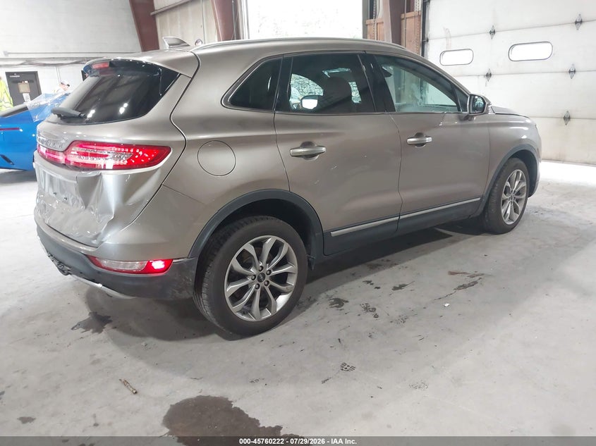 2019 Lincoln Mkc VIN 5LMCJ2D93KUL22618 IAAI salvage auction — FRONT & REAR, Salvage Title, sold $2,275 on 2026-09-09 (photo 4)