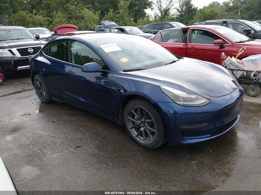 2021 Tesla Model 3 VIN 5YJ3E1EA1MF084861 IAAI salvage auction — SIDE, Salvage (Kansas), sold $5,300 on 2026-08-24 (photo 1)