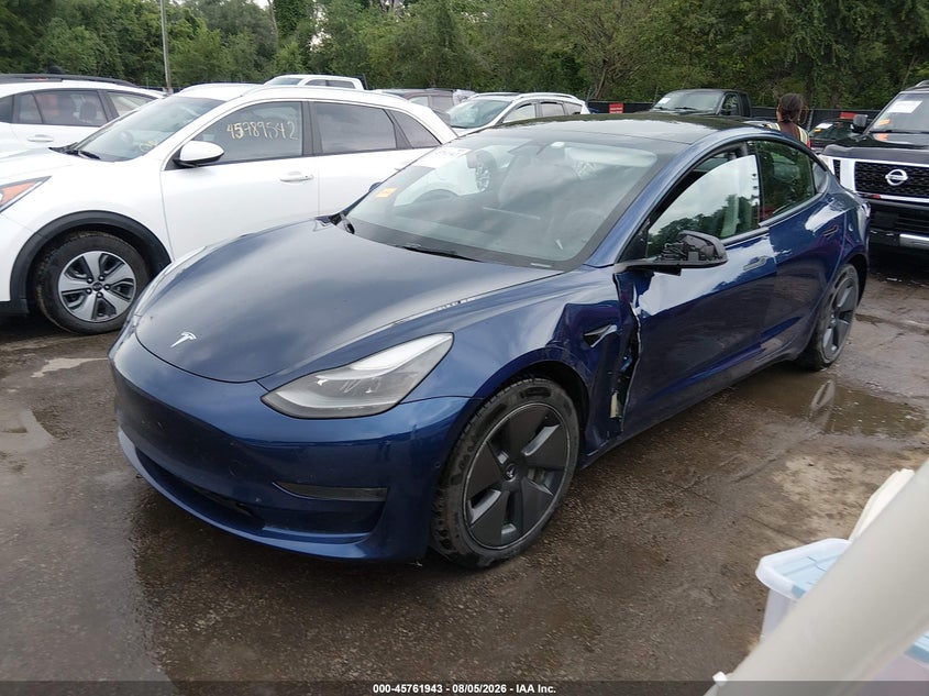 2021 Tesla Model 3 VIN 5YJ3E1EA1MF084861 IAAI salvage auction — SIDE, Salvage (Kansas), sold $5,300 on 2026-08-24 (photo 2)