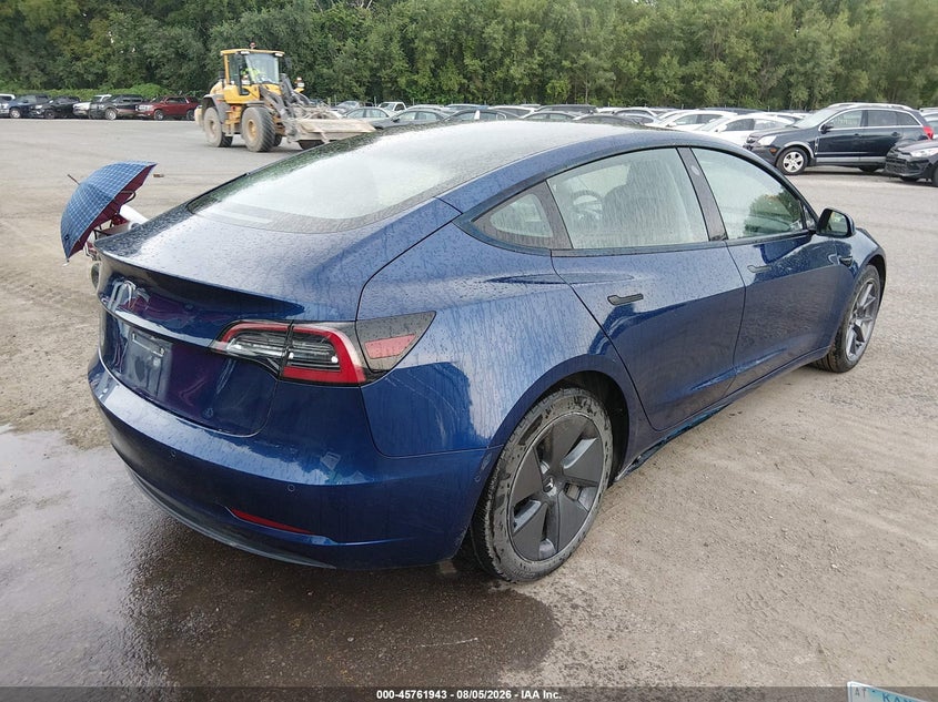 2021 Tesla Model 3 VIN 5YJ3E1EA1MF084861 IAAI salvage auction — SIDE, Salvage (Kansas), sold $5,300 on 2026-08-24 (photo 4)