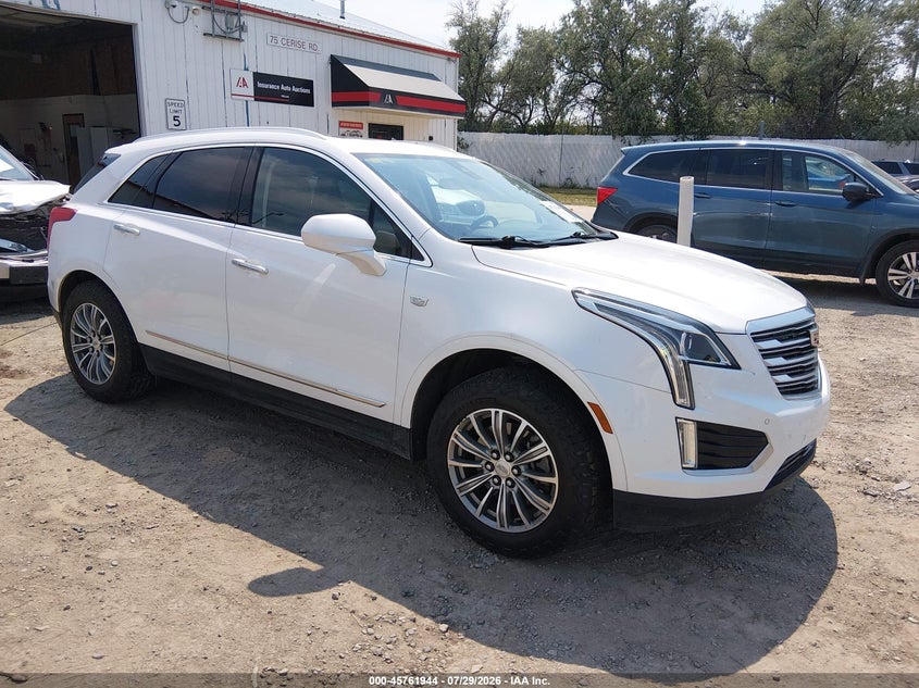 2018 Cadillac Xt5 VIN 1GYKNDRS2JZ157848 IAAI salvage auction — LEFT REAR, Salvage Title, sold $4,850 on 2026-09-16 (photo 1)