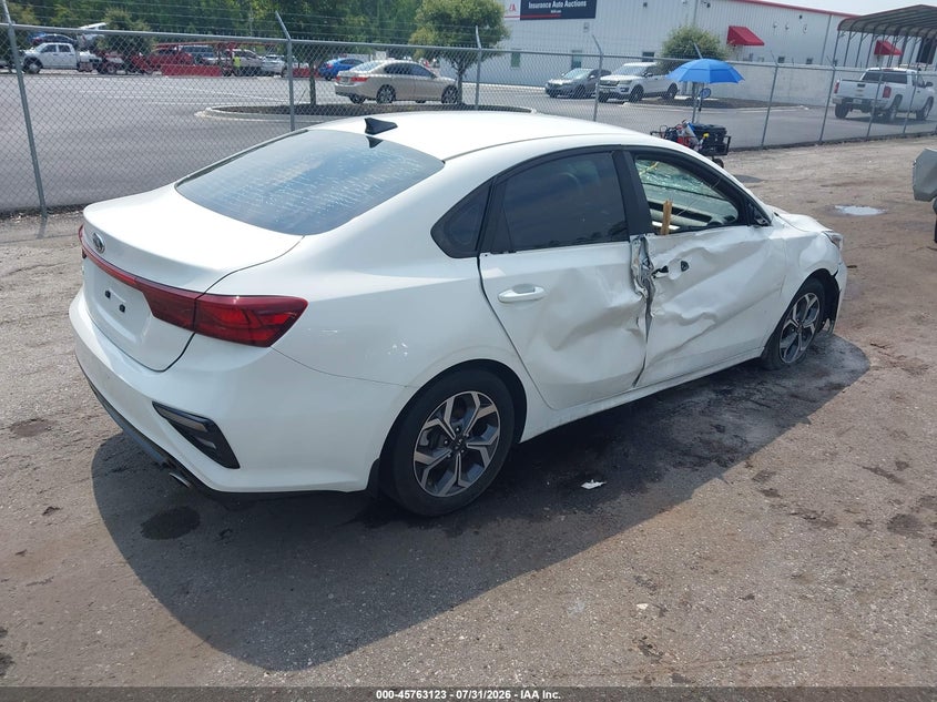 2019 Kia Forte VIN 3KPF24AD6KE104841 IAAI salvage auction — SIDE, Rebuildable (Florida), sold $2,650 on 2026-09-06 (photo 4)