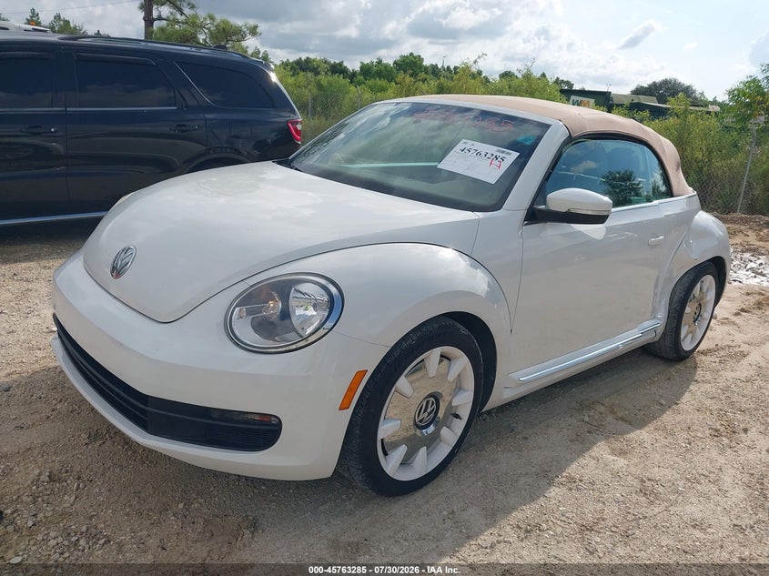 2013 Volkswagen Beetle VIN 3VW5P7AT3DM815800 IAAI salvage auction — SIDE, Rebuildable (Florida), sold $2,250 on 2026-08-06 (photo 2)