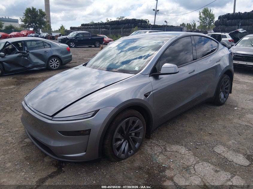 2026 Tesla Model y VIN 7SAYGDEE3TA636945 IAAI salvage auction — SUSPENSION, Wait Title, sold $24,250 on 2026-09-04 (photo 2)