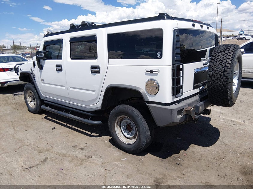 2004 Hummer H2 VIN 5GRGN23U14H100706 IAAI salvage auction — SIDE, Salvage (New Mexico), sold $3,000 on 2026-08-31 (photo 3)