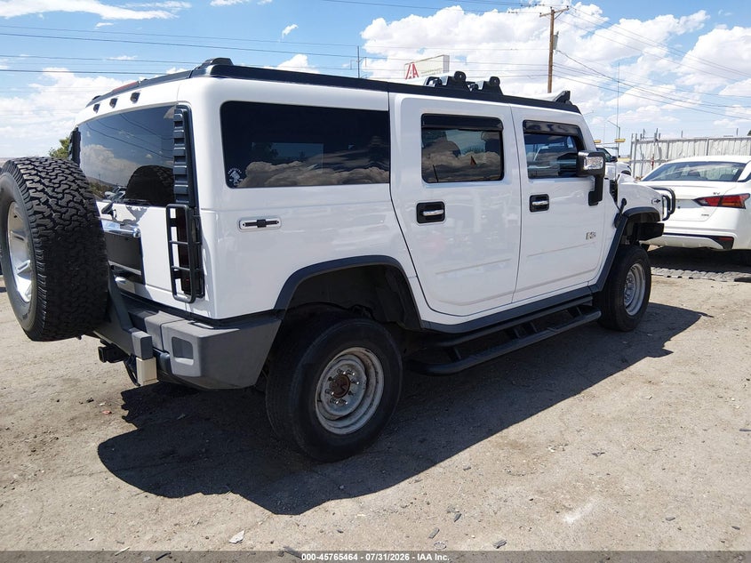 2004 Hummer H2 VIN 5GRGN23U14H100706 IAAI salvage auction — SIDE, Salvage (New Mexico), sold $3,000 on 2026-08-31 (photo 4)