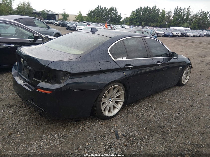 2011 BMW 5 series VIN WBAFU7C55BC777822 IAAI salvage auction — NORMAL WEAR, Clear (Rhode Island), sold $125 on 2026-08-04 (photo 4)
