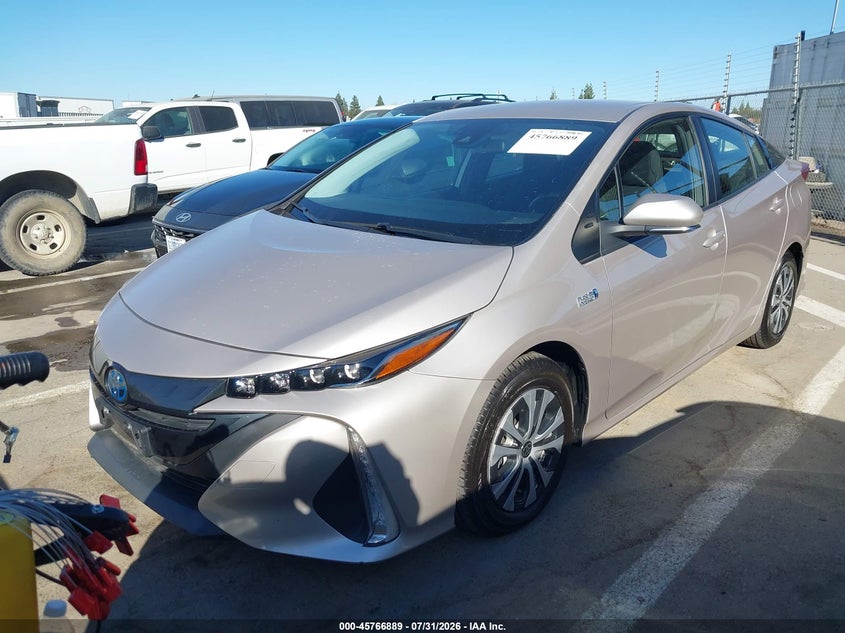 2021 Toyota Prius VIN JTDKAMFP7M3194791 IAAI salvage auction — UNKNOWN, Salvage Title, sold $13,450 on 2026-08-18 (photo 2)