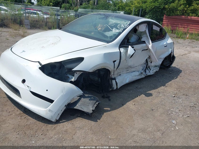 2020 Tesla Model y VIN 5YJYGDEE1LF057114 IAAI salvage auction — LEFT & RIGHT, Clear (Michigan), sold $1,450 on 2026-09-05 (photo 2)