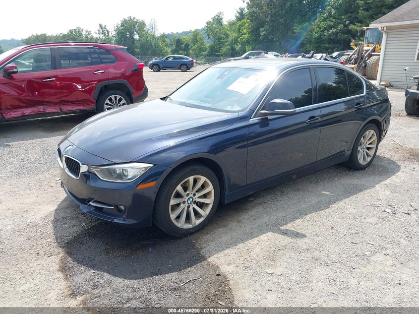 2015 BMW 3er VIN WBA3B9C59FF589829 IAAI salvage auction — REAR END, Salvage Title, sold $2,300 on 2026-08-24 (photo 2)