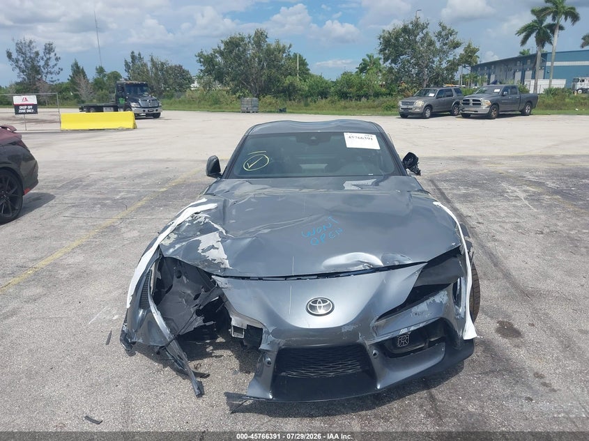 2022 Toyota Supra VIN WZ1DB0C09NW052434 IAAI salvage auction — ALL OVER, Salvage Title, sold $5,550 on 2026-08-06 (photo 6)