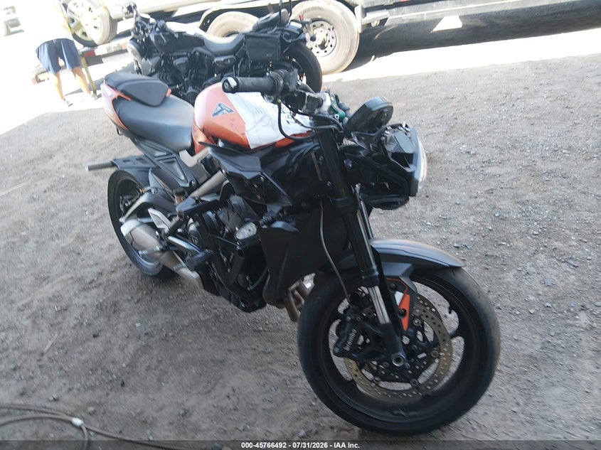 2025 Triumph motorcycle Street VIN SMTA604S8STCC4519 IAAI salvage auction — FRONT & REAR, Wait Title, sold $1,650 on 2026-09-29 (photo 1)