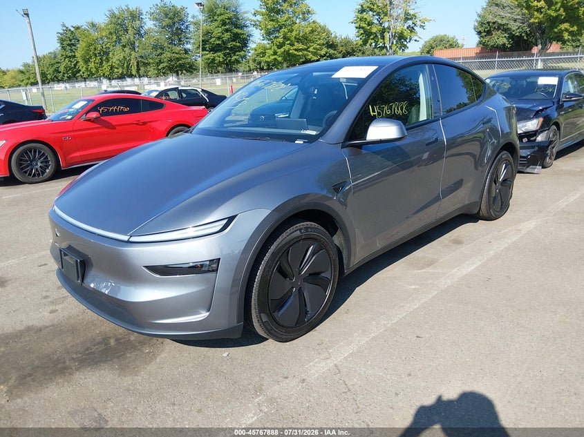 2026 Tesla Model y VIN 7SAYGDED7TA437713 IAAI salvage auction — WATER/FLOOD, Salvage (New Jersey), sold $27,900 on 2026-09-24 (photo 2)