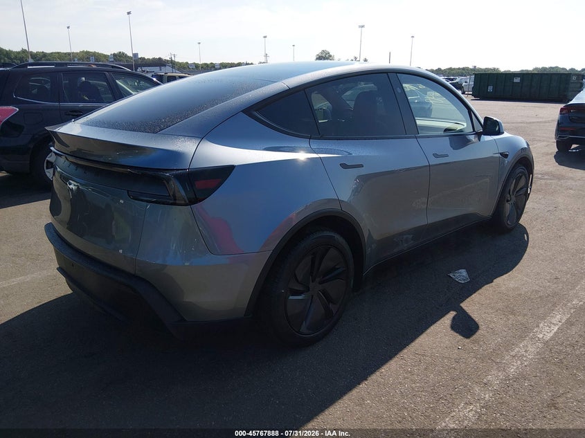 2026 Tesla Model y VIN 7SAYGDED7TA437713 IAAI salvage auction — WATER/FLOOD, Salvage (New Jersey), sold $27,900 on 2026-09-24 (photo 4)
