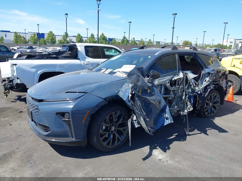 2025 Toyota Crown signia VIN JTDACAAJ0S3020565 IAAI salvage auction — LEFT SIDE, Salvage Title, sold $14,300 on 2026-09-04 (photo 2)