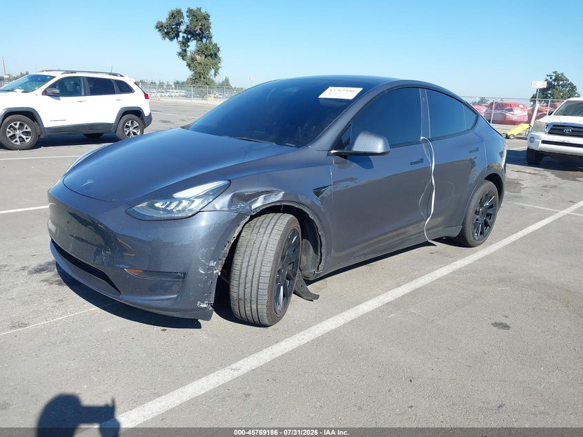 2023 Tesla Model y VIN 7SAYGDEE4PA113410 IAAI salvage auction — REAR END, Salvage (California), sold $13,400 on 2026-09-01 (photo 2)