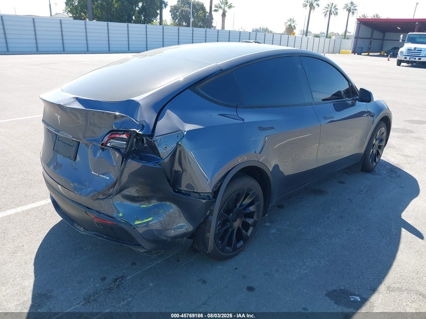 2023 Tesla Model y VIN 7SAYGDEE4PA113410 IAAI salvage auction — REAR END, Salvage (California), sold $13,400 on 2026-09-01 (photo 4)