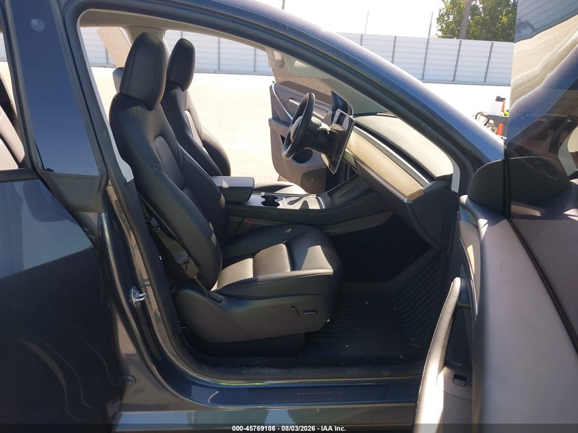 2023 Tesla Model y VIN 7SAYGDEE4PA113410 IAAI salvage auction — REAR END, Salvage (California), sold $13,400 on 2026-09-01 (photo 5)