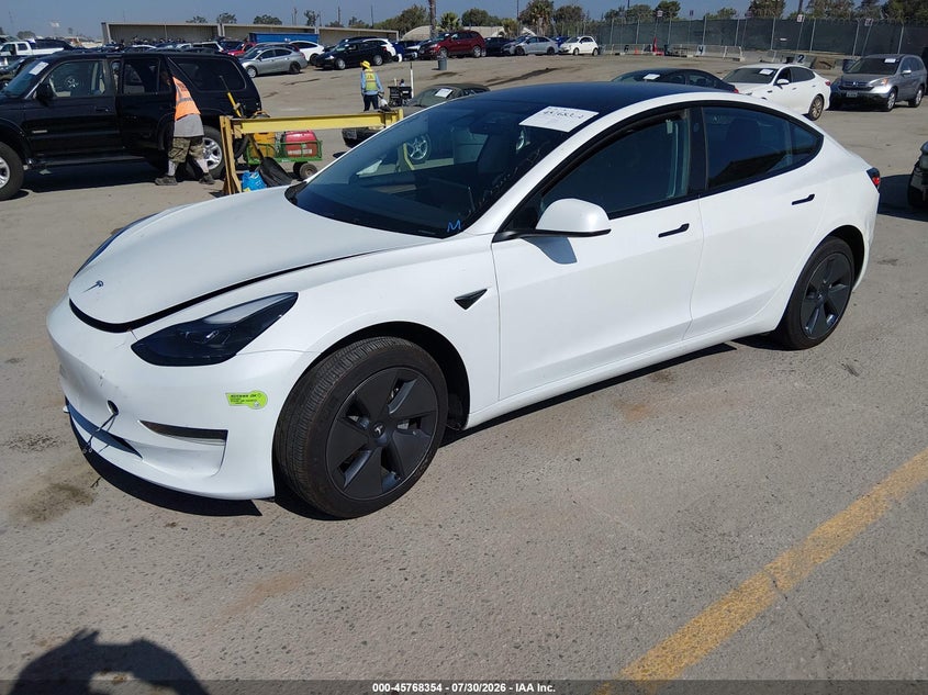 2023 Tesla Model 3 VIN 5YJ3E1EA0PF568203 IAAI salvage auction — RIGHT FRONT, Salvage (California), sold $6,500 on 2026-09-09 (photo 2)