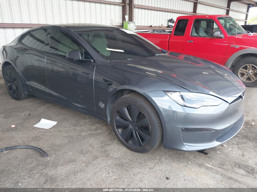 2021 Tesla Model s VIN 5YJSA1E59MF428477 — IAAI salvage auction photo