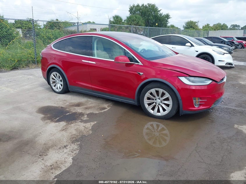 2018 Tesla Model x VIN 5YJXCBE23JF121877 — IAAI salvage auction photo