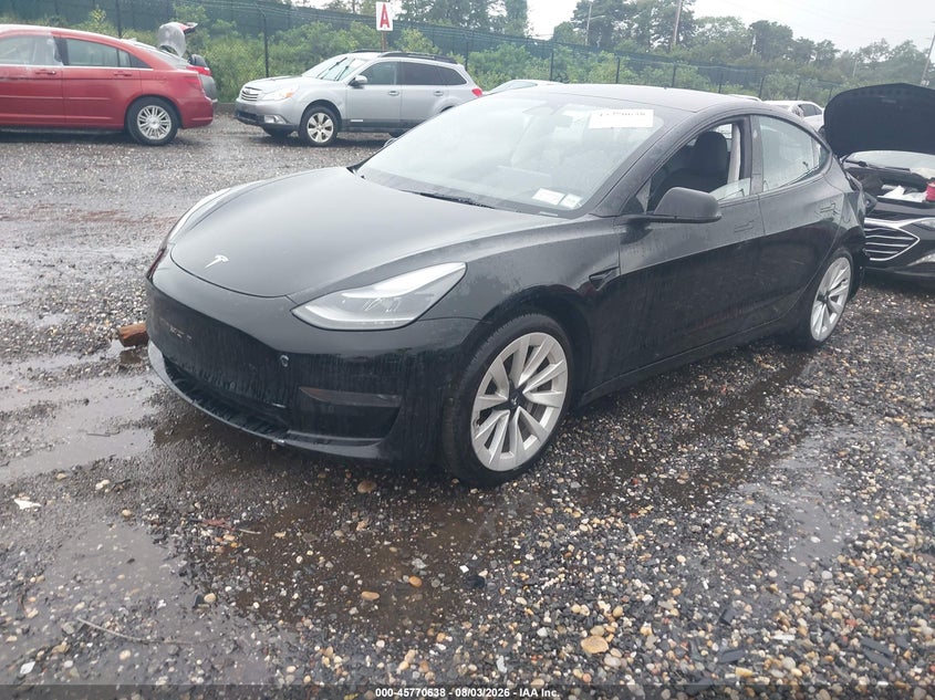 2022 Tesla Model 3 VIN 5YJ3E1EA9NF210076 IAAI salvage auction — LEFT REAR, Mv-907A (New York), sold $9,250 on 2026-08-29 (photo 2)