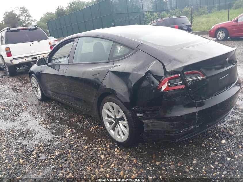 2022 Tesla Model 3 VIN 5YJ3E1EA9NF210076 IAAI salvage auction — LEFT REAR, Mv-907A (New York), sold $9,250 on 2026-08-29 (photo 3)