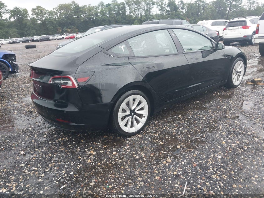2022 Tesla Model 3 VIN 5YJ3E1EA9NF210076 IAAI salvage auction — LEFT REAR, Mv-907A (New York), sold $9,250 on 2026-08-29 (photo 4)