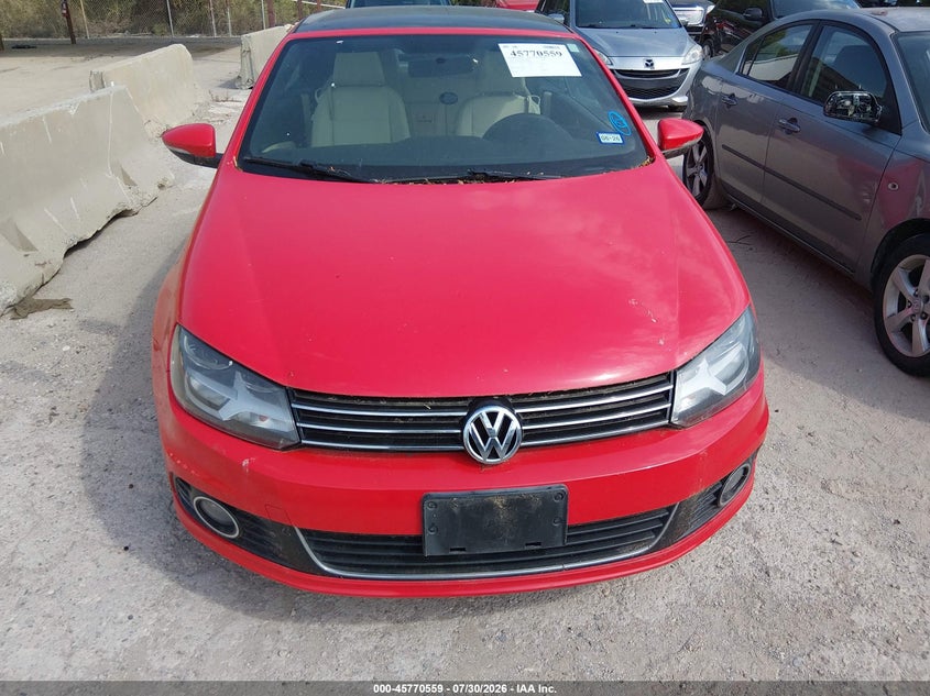 2016 Volkswagen Eos VIN WVWBW8AH7GV000889 IAAI salvage auction — NORMAL WEAR, Salvage Title, sold $25 on 2026-08-17 (photo 6)