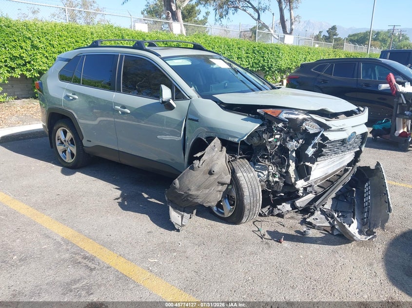 2021 Toyota Rav 4 VIN JTMB6RFV9MD041000 — IAAI salvage auction photo