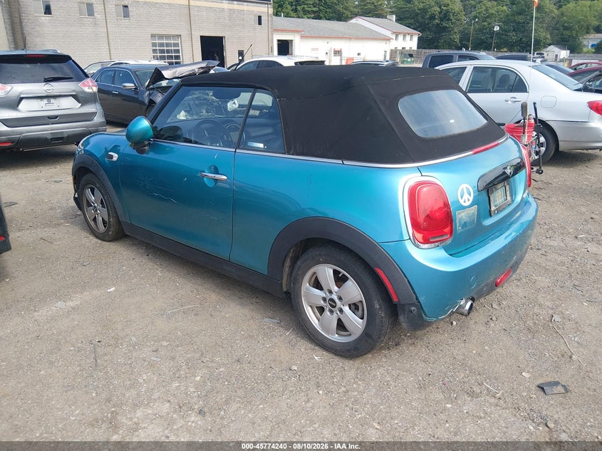 2018 Mini Convertible VIN WMWWG5C53J3D00903 IAAI salvage auction — SIDE, Salvage (Massachusetts), sold $2,000 on 2026-08-27 (photo 3)