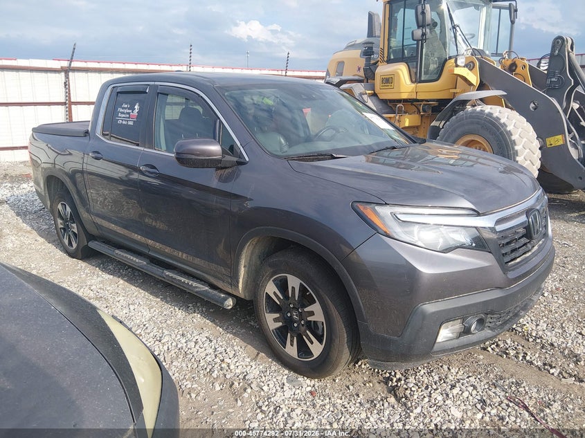 2020 Honda Ridgeline VIN 5FPYK3F5XLB022439 — IAAI salvage auction photo