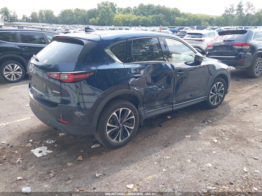 2022 Mazda Cx-5 VIN JM3KFBDM4N0535461 IAAI salvage auction — SIDE, Salvage Title, sold $9,800 on 2026-09-27 (photo 4)