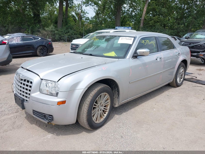 2010 Chrysler 300 VIN 2C3CA5CV8AH191523 IAAI salvage auction — FRONT & REAR, Clear (Indiana), sold $600 on 2026-09-10 (photo 2)
