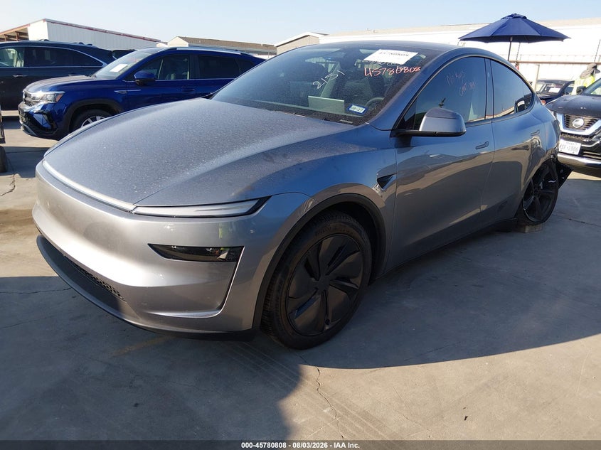 2026 Tesla Model y VIN 7SAYGDED0TA452151 IAAI salvage auction — LEFT REAR, Original (Texas), sold $23,950 on 2026-09-15 (photo 2)