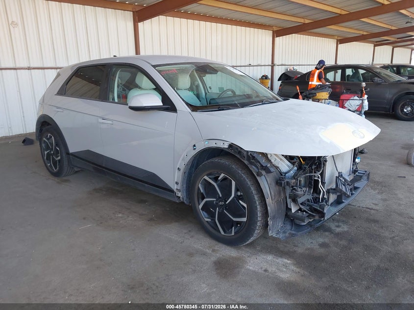 2022 Hyundai Ioniq 5 VIN KM8KNDAF8NU103652 IAAI salvage auction — FRONT & REAR, Salvage Title, sold $9,400 on 2026-08-14 (photo 1)